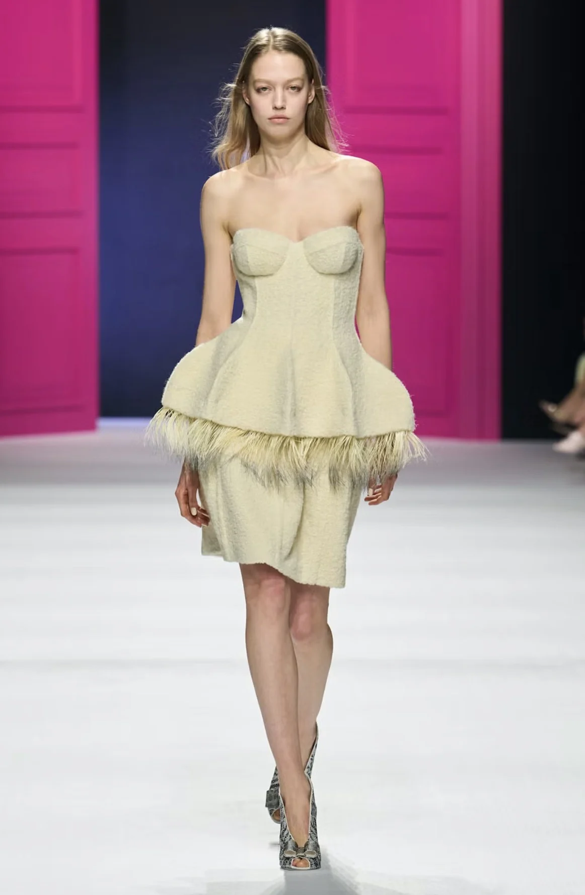 Zendaya Hints at Two Upcoming Films Through Feathered Peplum Gown